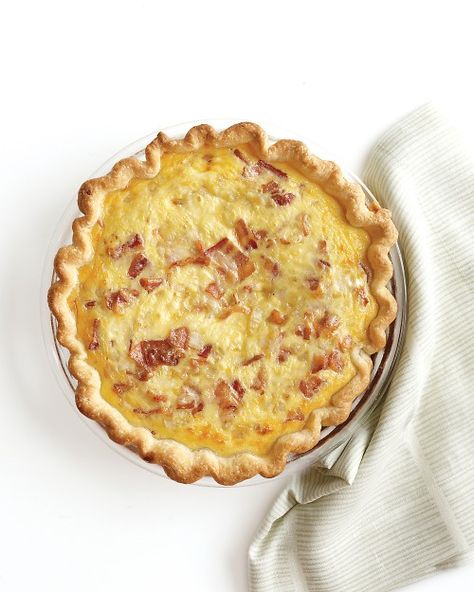 This versatile dish goes from brunch buffet to dinner table in a snap and is great with a leafy green salad -- Bacon-Cheese Quiche Recipe Basic Quiche Recipe, Bacon And Cheese Quiche, Cheese Quiche Recipe, Easy Quiche, Bacon Quiche, Cheese Quiche, Breakfast Quiche, Quiche Recipe, Brunch Buffet