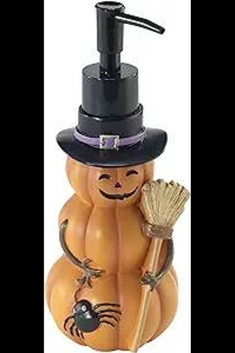 Triple Pumpkin soap dispenser/lotion pump is a twist on a holiday snowman--made out of pumpkins. Wearing a smile, a pilgrim hat, holding a broom with a friendly spider crawling on him, it's sure to make bath time fun time. Made of durable resin for years of use. #Pintrest #Halloween #Pumpkin #soapdispenser #indoorhalloween #halloweendecorations Pumpkin Lotion, Spider Crawling, Guest Bathroom Essentials, Ivory Pillar Candles, Halloween Soap, Pumpkin Soap, Halloween Bathroom, Spooky Home Decor, Pilgrim Hat