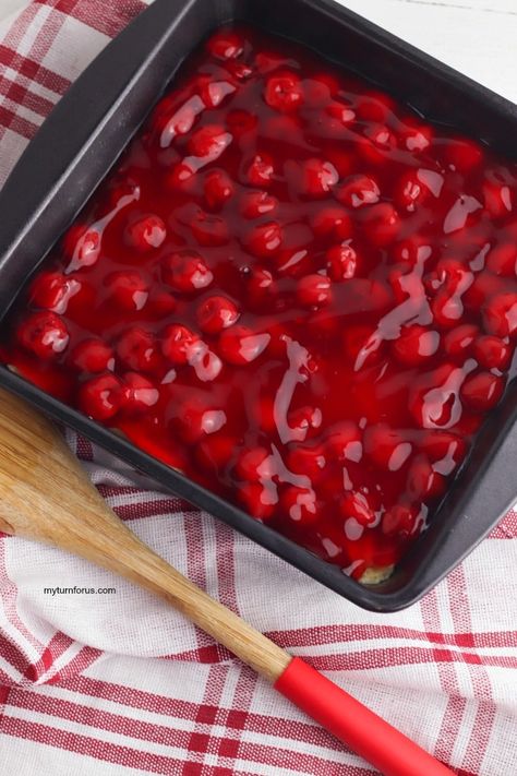 Pour cherry pie filling on top of dough for cherry squares Cherries In The Snow Recipe, Almond Poppy Seed Bread, Carrot Sheet Cake Recipe, Peach Pie Bars, Carrot Sheet Cake, Easy Cherry Pie, Blueberry Recipes Easy, Refrigerated Desserts, Peppermint Chocolate Chip Cookies