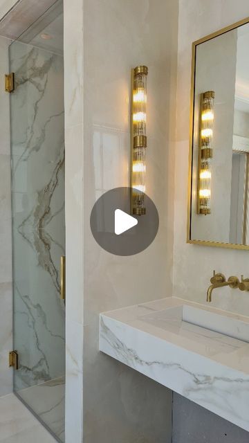 Faye Robinson-Hey on Instagram: "Recently installed luxury master ensuite 🤍 . Our client brief asked for a hotel feel scheme with a clean, modern but luxe aesthetic . . . We extended a small existing shower enclosure creating a generous walk in shower with book matched tiles and bespoke full height frameless glass door on brass pivot hinges. A custom made double sink made in matching porcelain with back lit brass trimmed mirror and wall lights takes centre stage. The toilet is partially concealed behind the newly formed full height vanity frame and has a hidden cistern within a new porcelain cladd wall housing recessed LED lighting. A simple but chic freestanding bath positioned to allow our client privacy whilst affording beautiful views out of the windows. New dropped perimeter ceiling Book Match Tiles, Luxury Master Ensuite, Recessed Led Lighting, Frameless Glass Door, Client Brief, Hidden Toilet, Luxe Aesthetic, Frameless Glass Doors, Led Recessed Lighting