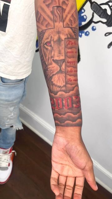 Jay Tattz on Instagram: "Lion cross and lettering on this one #inkstar🌟" Lion And Cross Tattoo, Lion Cross Tattoo Design, Leo Forearm Tattoo For Men, Tattoo Ideas Leo, Lion Cross Tattoo, Lion Tattoo For Men, Forearm Tattoo For Men, Leo Tattoo For Men, Tattoos For Guys Forearm