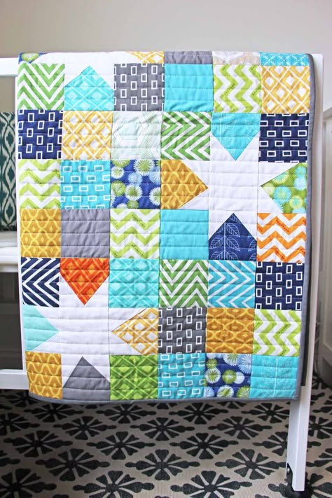 9 patch with stars.  Use up scraps.  http://www.vanessachristenson.com/2013/04/v-and-co-reverse-hopscotch-done.html Colchas Quilting, Charm Square Quilt, Charm Pack Quilt, Charm Pack Quilts, Quick Quilt, Quilt Modernen, Charm Quilt, Quilt Baby, Nine Patch