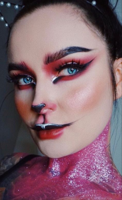 Evil Cat Makeup, Cat Alice In Wonderland Makeup, Adult Cat Makeup, Cheshire Cat Smile Makeup, Blacklight Halloween Makeup, Cat From Alice In Wonderland Makeup, Alice In Wonderland Cheshire Cat Makeup, Cat Makeup Costume, Cheshire Cat Inspired Makeup