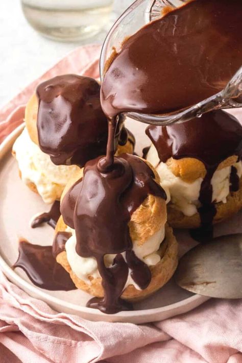 Learn How To Make Profiteroles with my comprehensive guide. French choux pastry is used to make crispy choux buns which are filled with sweet vanilla ice cream and topped with a homemade chocolate sauce. This nostalgic, classic dessert is a world renowned favourite for good reason- they are delicious! Recipe by Emma Duckworth Bakes. Profiteroles Recipe, Homemade Chocolate Sauce, Hot Chocolate Sauce, Choux Buns, Profiterole, Preppy Kitchen, French Recipes, Pastry Shells, Choux Pastry