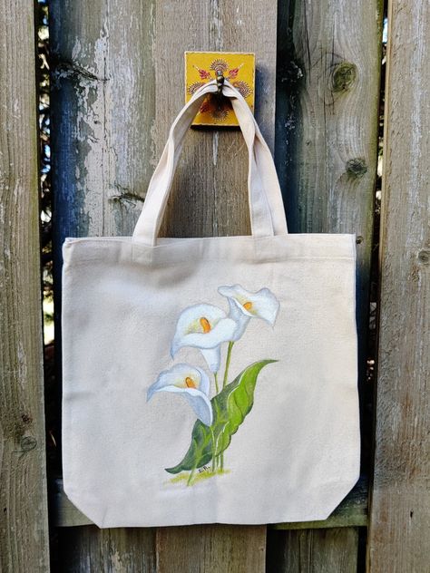 Language Of The Flowers, Jute Bags Design, Diy Tote Bag Design, Painted Canvas Bags, White Calla Lilies, Handpainted Tote Bags, Totes Ideas, Flower Painting On Canvas, Red Roses Wallpaper