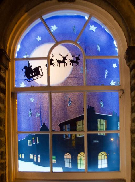 Saltaire Living Advent Calendar display set to be biggest yet | Bradford Telegraph and Argus Christmas Window Projections, Christmas Home Window Display, Christmas Window Advent Calendar, Window Advent Calendar, Advent Calendar Window Display, Christmas Advent Window Display, Living Advent Calendar Window Ideas, Advent Window Display, Christmas Advent Window