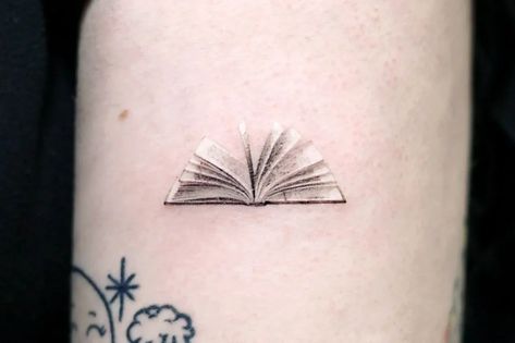 Book Hand Tattoo, Tiny Book Tattoo Minimalist, Book Ankle Tattoo, Book Wrist Tattoo, Tattoo Ideas Bookish, Book Tatoos Woman, Places For Small Tattoos On Women, Small Book Tattoos For Women, Small Bookish Tattoos