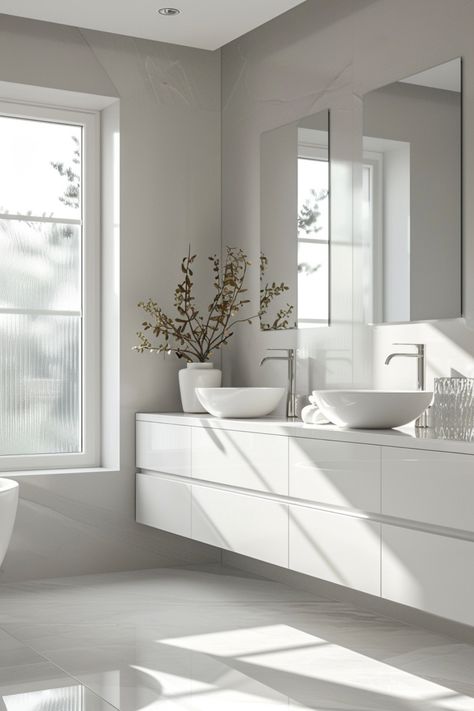 all white bathroom designs ideas decor tips 16 White Vanity Grey Countertop, All White Bathroom Ideas, Modern Bathroom White, White Washroom, White Gloss Bathroom, Modern Washroom Design, Bathroom Designs Ideas, White Bathroom Ideas, All White Bathroom