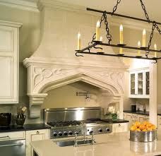 kitchen hood. love the gothic arch Stone Range Hood, French Inspired Kitchen, Hood Range, Tudor Kitchen, Chimney Range Hood, Range Hood Vent, Kitchen Hood, Kitchen Range Hood, Stone Kitchen