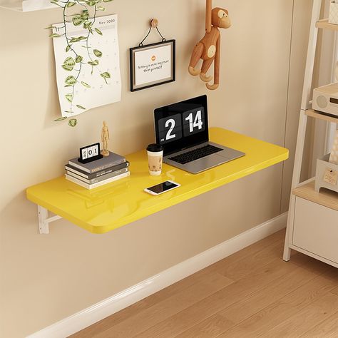 PRICES MAY VARY. 【Space Saving & Foldable】: The wall mounted folding table brackets is foldable design, simply press the release arm to 90 degrees collapse the table. Compared with traditional desks, this desk can greatly save floor space and turn your wall into an efficient work area 【Sturdy Design】: The floating wall desk adopting a 0.7“ thick density board,built in solid steel brackets provide exceptional support, allowing the table to hold weights of up to 110 lbs. providing you with a firm, Desk Ideas For Small Spaces, Floating Desk Ideas, Floating Wall Desk, Mounted Folding Table, Wall Mounted Folding Table, Cheap Desk, Small Computer Desk, Small Office Desk, Foldable Desk