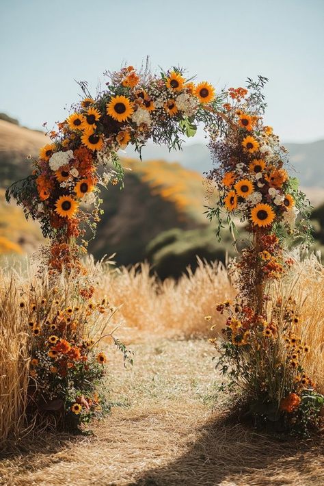 29 Boho Wedding Arch Ideas to Create a Dreamy Backdrop 17 Boho Wedding Sunflowers, 2024 Wedding Arch Trends, Sunflower Wedding Arch Rustic, Sunflower Farm Wedding, Sunflower Decor Wedding, Wedding Arch Ideas Rustic, Wedding Decor Sunflowers, Sunflower Wedding Theme Rustic, Boho Sunflower Wedding