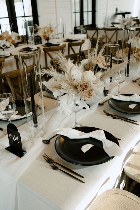 Unconventional Rehearsal Dinner, Black And White Wedding Theme Dresses, Goth Boho Wedding Decor, Black And White Modern Boho Wedding, Black Plates Table Setting Wedding Ideas, Black And Beige Wedding Table, Black And Tan Table Setting, Beige And Black Wedding Decor, Backyard Wedding Black And White