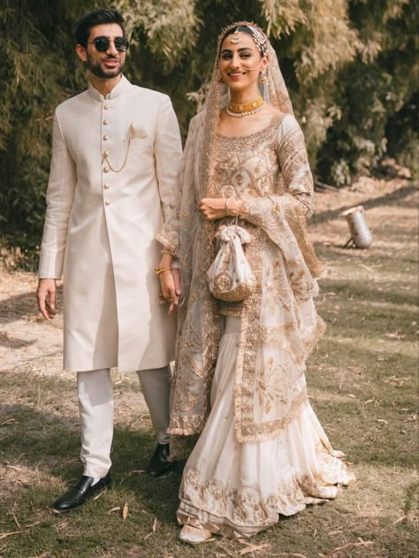 White And Gold Nikkah Outfit, Gold Nikkah Outfit, Nikkah Outfit Bride And Groom, Nikkah Dress Pakistani White And Golden, Off White Indian Wedding Dress, Nikkah Inspo Dresses, Nikkah Sherwani, Pakistani Men Wedding Outfit, Pakistani Bride And Groom Outfits