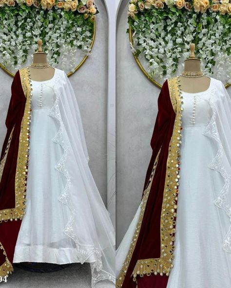 Catalog Name: *White Gown* 🎗Description 🎗 Looking for this same colour beautiful Designer Padded Suit with 2 Dupatta On Chinon Silk febric with inner and canvas Patta and 1st dupatta on Velvet Febric with Mirror work,2nd Dupatta with tibby silk and Thred work. 💃🏻💃🏻 *Suit*💃🏻💃🏻 Fabric. :-Chinon Silk with inner Work :-Padded and Potali Button With Canvas Patta Size :-Up to 42(Full-Stitched) Flair :-4.2M Weight :-1.4 KG 🥻*Dupatta*🥻 *1 Dupatta Fabric* :-Velvet Work :- Thred work With Mirror Si... White Gown With Red Dupatta, White Colour Dress Design, White Kurta With Red Dupatta, White Suit With Red Dupatta, White Pakistani Suit, White Anarkali Suits, White Dupatta, White Frock, Velvet Dupatta