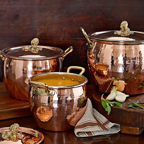 Ruffoni Copper Artichoke-Handle Stock Pots. Hand-hammered at a family-owned workshop in the Italian Alps, this versatile stockpot is crafted from a single sheet of copper then lined with tin. The heat-responsive pan is finished with handles and a lid adorned with sculptural artichokes and their graceful leaves. Crafted of hand-hammered copper for excellent heat conductivity. Copper Pots And Pans, Cocina Shabby Chic, Copper Utensils, William Sonoma, Stock Pots, Copper Kettle, Copper Pans, Copper Cookware, Copper Accents