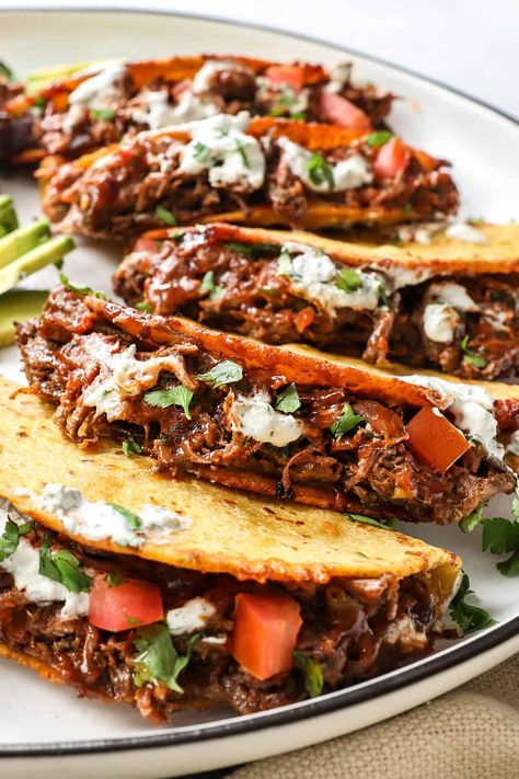 Crispy Baked Shredded Beef Tacos (crockpot, oven, stove or instant pot) Beef Tacos Crockpot, Shredded Beef Tacos Instapot, Insta Pot Shredded Beef Tacos, Crispy Shredded Beef Tacos, Shredded Beef Tacos Crockpot, Pulled Beef Tacos, Shredded Beef Tacos Oven, Crispy Shredded Beef, Baked Crunchy Beef Tacos