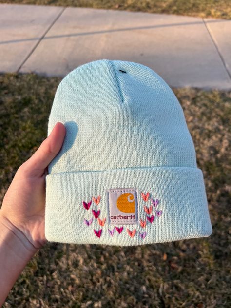 Hand Embroidery For Clothes, Carhartt Embroidery Diy, How To Embroider Carhartt Beanie, Hand Embroidery Carhartt Beanie, Winter Hat Embroidery, Carhartt Beanie Embroidery Flowers, Embroidery Beanie Ideas, Carhartt Embroidered Beanie, Hand Embroidered Beanie