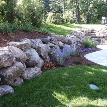 Boulder Retaining Wall - Photos & Ideas | Houzz Boulder Retaining Wall, Rock Retaining Wall, Garden Retaining Wall, Landscaping With Boulders, Landscaping Retaining Walls, Sloped Garden, Rock Wall, Landscape Services, Retaining Walls