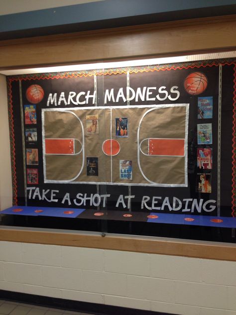 Middle school library bulletin board for March - March Madness, take a shot at reading! March Madness Bulletin Board, Middle School Library Bulletin Boards, School Library Bulletin Boards, March Bulletin Board, School Library Decor, March Reading, Reading Display, School Library Displays, Library Bulletin Board