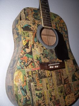 Decoupage Comic Strip Guitar. - THIS IS THE COOLEST IDEA! Will be doing this to something... Guitar Graffiti, Comic Crafts, Diy Comic Book, Comic Book Crafts, Diy Comic, قلعة هاول المتحركة, Jam Room, Guitar Shelf, Ukulele Design