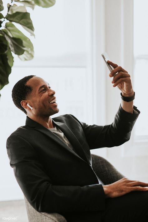 Black man with earphones video calling | premium image by rawpixel.com / Felix Phone Call Photo, Black Man Suit, Business Man Photography, Mobile Phone Photography, African American Man, Women Laughing, Man Suit, Business Photoshoot, Women Talk