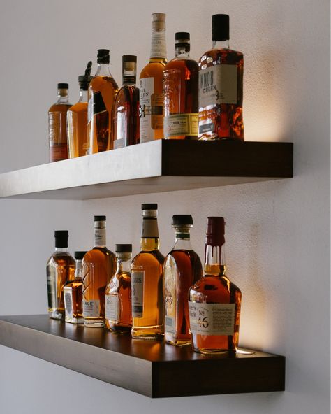 Raising a glass to craftsmanship this World Whiskey Day! 🥃 Keep your spirits high and your favorite bottles on display with our LED floating shelves. Pictured here: Maple Shelves in Medium brown, 4000k LED. #worldwhiskeyday #floatingshelves Whiskey Collection Display, Whiskey Shelves, Led Floating Shelves, Whisky Display, Maple Shelves, Whisky Cabinet, Masculine Office, Furniture Graphic, Custom Floating Shelves