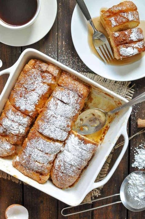 Hasselback Baked French Toast in a baking dish, hot out of the oven and ready to be served. Breakfast To Feed A Crowd, Toast Recipe Breakfast, Baked French Toast, Breakfast For A Crowd, Hasselback Potatoes, Recipetin Eats, Feed A Crowd, French Toast Bake, Egg Breakfast