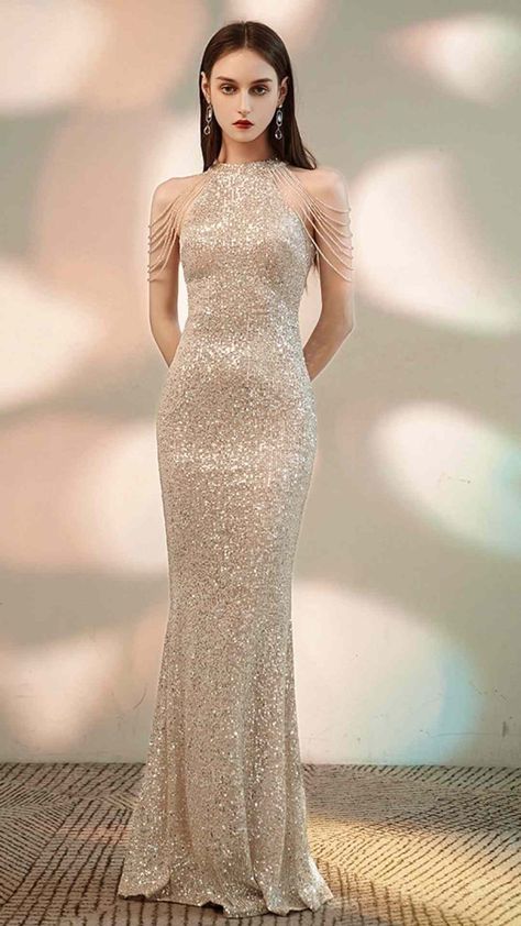 Elegant and classy, our beaded sequin dress is an ultra glamorous way to add sexiness to your evening outings. Cut from polyester materials in a shimmering gold hue, embellished with beads at the shoulder. This Sequined evening dress is designed for a mermaid silhouette, featuring flattering natural waistline. Material+ Care 100% Polyester Care: Dry Clean Only Manufacturing Country Made In China Dresses Sparkle, Trumpet Prom Dress, Sequin Evening Dress, Sequin Evening Dresses, Party Kleidung, Bodycon Maxi Dresses, Sparkle Dress, Women's Evening Dresses, Midi Maxi Dress