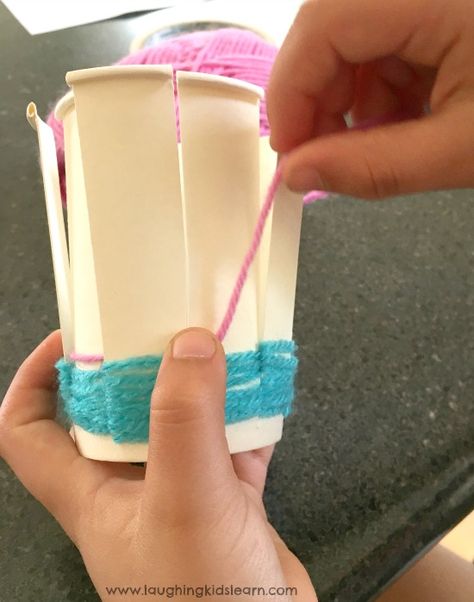 weaving yarn on a paper cup Paper Cup Yarn Basket, Cup Weaving For Kids, Paper Cup Basket Weaving, Paper Cup Weaving, Yarn Basket Weaving Diy, Paper Cup Art, Cup Weaving, Plate Weaving, Easy Weaving