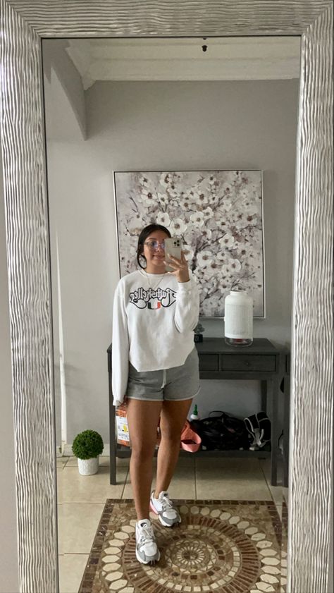 Full body mirror selfie of a girl wearing a white sweatshirt, grey sweatshorts, and athletic sneakers Grey Sweat Shorts Outfit Aesthetic, Athleisure Gray Shorts, Gray Comfy Everyday Sweater, Gray Go-dry Athleisure Shorts, Everyday Cozy Gray Sweatshirt, White And Grey Outfit, White Sweater Outfit, Cosy Outfit, Outfit White