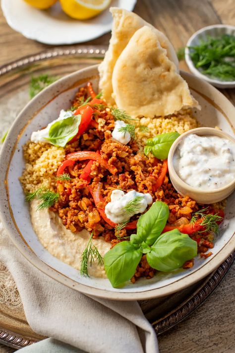 These Vegan Harissa Beef Couscous Bowls are layered with lemon couscous, hummus, veggies, "beef" crumbles and vegan feta sauce | ThisSavoryVegan.com Beef Couscous, Couscous Protein Bowl, Southwest Couscous Bowl, Vegan Couscous Bowl, Roasted Veggie Couscous, Vegan Couscous Recipes, Tofu And Couscous, Couscous Bowls, Vegan Couscous