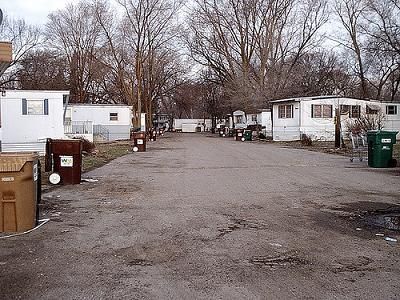 Trailer park Trailer Trash Aesthetic, Apocalyptic Crush, Trailer Parks, Liminal Places, Project Zomboid, Trash Magic, Trailer Park Princess, Jacaranda Tree, Trailer Park Boys