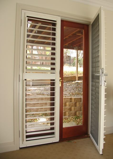 Door shutters Balcony Door With Grill, Balcony Door Design Indian, Foldable Grill Door For Balcony, Sliding Shutters Exterior Balcony, Security Screen Door For French Doors, Door Trellis, Home Window Grill Design, Small Room Interior, Rooftop Patio Design