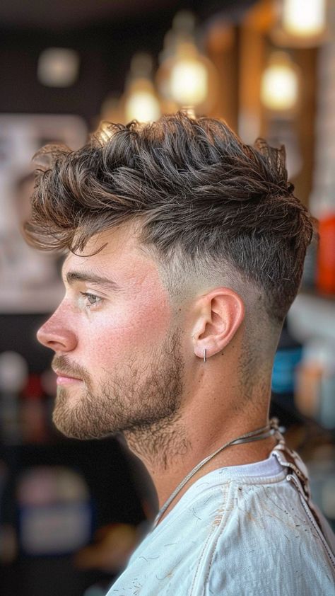 Get Faded: 27 Hairstyles That Showcase Men's Boldness Men’s High Fade Haircut, Edgy Haircuts Men, Edgy Mens Haircut, Fauxhawk Fade Men, Long Hair Short Sides, Popular Haircuts For Men, Faux Hawk Men, Classic Mens Haircut, Low Taper Fade Haircut