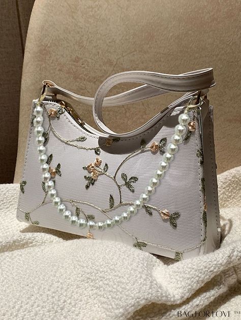 BagForLove - Floral Embroidered Faux Pearl Baguette Handbag - Elegant and Sophisticated Product Description Color Multicolor Details Pearls Magnetic No Type Baguette Bag Bag Size Medium Pattern Type Plants Style Fashionable Coating 100% Polyurethane Composition 100% Polyurethane Material PU Leather Size Chart INCH CM Bag Length Bag Width Bag Height Handle Height 9.8 inch 2.8 inch 6.7 inch 13 inch Bag Length Bag Width Bag Height Handle Height 25 cm 7 cm 17 cm 33 cm Details Pictures Similar Produc Brady Bag, Embroidered Purse, Embroidered Shoulder Bag, Pearl Clutch, Pearl Decor, Party Purse, Leather Floral, Elegant Pendant, Baguette Bag