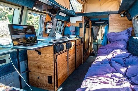 Great use of space! I love how the computer desk folds out in this DIY campervan build. It has good organization and a cool layout. #vanlife Vans Life, Van Project, Grid Ideas, Van Lifestyle, Van Travel, Converted Vans, Campervan Ideas, Van Dwelling, Vw Ideas