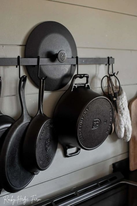 How To Store Cast Iron Pans, Cast Iron Pot Storage Ideas, Hang Cast Iron Pans, Cast Iron Organization, How To Store Cast Iron Cookware, Cast Iron Skillet Organization, Cast Iron Pot Storage, Organizing Cast Iron Pans, How To Store Cast Iron Skillets