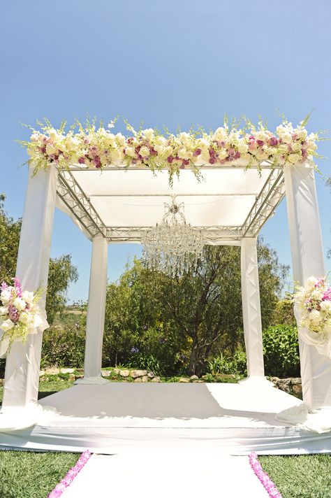 Chandelier for wedding ceremony suspended on truss because of the weight Tent Ideas, Entry Gate, Events Planner, Marketing Events, Wedding Canopy, Wedding Altars, Beautiful Beach Wedding, Center Of Attention, Los Angeles Wedding