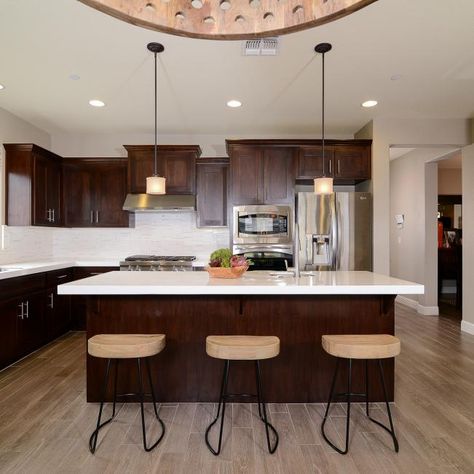 Eat-In Transitional Kitchen Has Dark Cabinets and Granite Countertops | HGTV Kitchen Cabinets Cherry Wood, Cherry Wood Kitchen, Wood Kitchen Decor, Cherry Wood Kitchen Cabinets, Cherry Wood Kitchens, White Kitchen Countertops, Cherry Wood Cabinets, White Kitchen Appliances, Brown Kitchen Cabinets