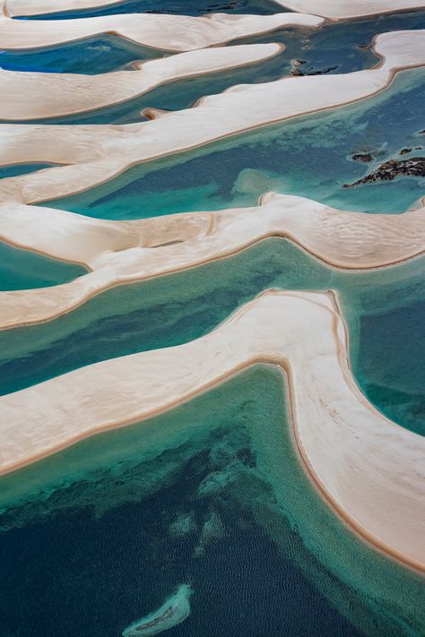 It’s lagoon after lagoon after lagoon at Lençóis Maranhenses. This out-of-this-world park is in fact a very real place on Brazil’s northwestern tip. Visit in summer when water levels are high and flight rates are low. (Unless taking expensive trips to see dry sand is your thing.) #travel #summer #Brazil #Sao Luis #travelguide Brazil Tourism, Brazil Travel Guide, Visit Brazil, Dry Sand, Brazil Travel, Summer Destinations, Travel Summer, In Summer, Kayaking