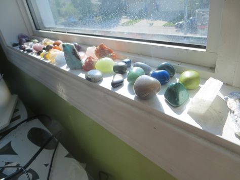 Cleansing crystals, gems and stones on a sunny window sill. Crystals On Windowsill, Aesthetic Window Sill, Window Sill Aesthetic, Window Sill Decor Ideas, Window Sill Ideas, Cottage Eclectic, Bay Window Decor, Spiritual Vibes, Window Sill Decor