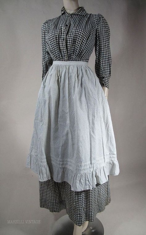 1890 aprons | 1890's Black & White Gingham Day Dress With Calico Apron 1900s American Fashion, 1800 Poor Clothing, 1890s Fashion Women Day Dresses, 1900s Fashion Poor, Victorian Poor Clothes, 1890s Fashion Women Casual, 1890s Dress Poor, 1840s Fashion Poor, Poor Victorian Clothes