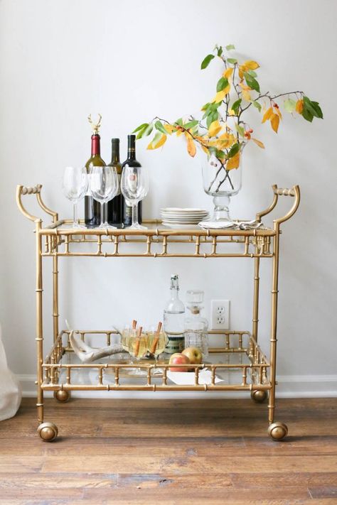 Bring in fresh flowers and fruit when styling your bar cart as seen on Bazaar Brass Bar Cart, Diy Bar Cart, Gold Bar Cart, Outside Bars, Bar Cart Styling, Bar Designs, Beautiful Bars, Mini Bars, Bar Cart Decor