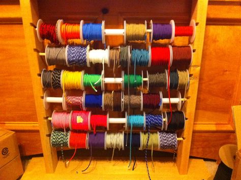 I have acquired over 42 colors.  and built a nice little organization rack.  Each spool is about 200' - menaing I can literally say I have a Mile of 550Lb Mil-Spec Paracord "laying around the house" Paracord Storage Ideas, Paracord Storage, Paracord Organization Ideas, Paracord Sling, Paracord Supplies, Paracord Accessories, Paracord Projects Diy, 550 Cord, Paracord Braids