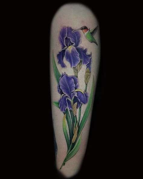 Hummingbird Iris Tattoo, Neo Traditional Iris Tattoo, Iris And Hummingbird Tattoo, Purple Iris Tattoo Design, Purple Iris Tattoo, Iris Tattoo Design, Snapdragon Tattoo, Colorful Hummingbird Tattoo, Goddess Iris