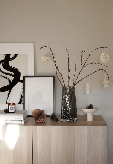 Festive sideboard display with Scandinavian paper stars, bare branches and pine cones | Minimalist Christmas decorations in neutral, nature-inspired colours | These Four Walls blog Finish Work, Office Christmas Decorations, Christmas Living Rooms, Minimalist Christmas, Star Decorations, Christmas Mood, Minimalist Kitchen, Decorative Panels, Wall And Floor Tiles