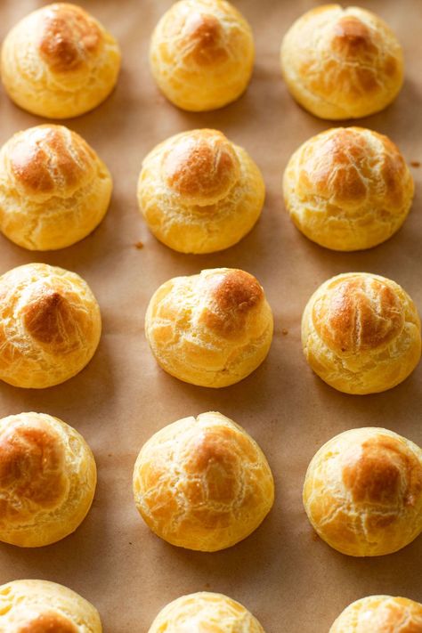 Choux Pastry, despite it's reputation, is actually quite easy to make. Use it to make all different types of desserts, such as cream puffs, eclairs, fried crullers or churros. This guide is all about How to Make Choux Pastry so you can master that magical pastry and make endless desserts! Choux Paste, Choux Cream, Choux Buns, Types Of Desserts, Choux Pastry, Cream Puffs, Italian Desserts, Eclairs, Bake Sale