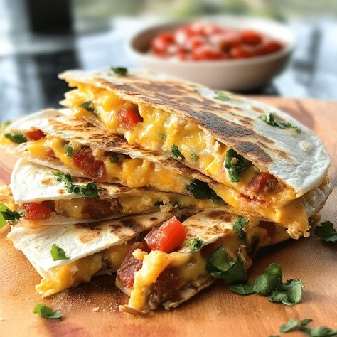 Easy and delicious breakfast quesadillas with fluffy eggs, cheese, and your choice of meats and veggies. Perfect morning meal! Egg Quesadilla Breakfast, Quesadilla Breakfast, Egg Quesadilla, Breakfast Quesadillas, Breakfast Quesadilla, Fluffy Eggs, Quesadilla Recipes, Perfect Morning, Kid Food