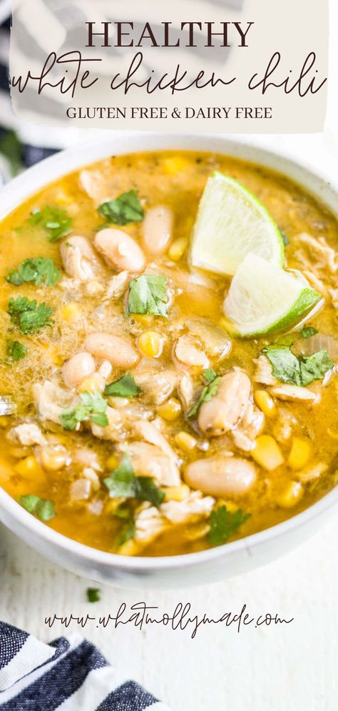 This healthy white chicken chili recipe is a clean eating meal you can throw in the crockpot and forget about. It's made with veggies, protein, beans and is still creamy even though it's dairy free. Not to mention it has 10 net carbs and gluten free! Chicken Soup Gluten Free Dairy Free, Chicken Chili No Beans Crockpot, Dairy Free Whole Food Recipes, Lactose Free White Chicken Chili, Keto Dinner Recipes Crock Pot Low Carb, Crockpot Soup Non Dairy, Crockpot Recipes Gf Df, Gluten Free White Bean Chicken Chili, White Bean Chicken Chili Non Dairy