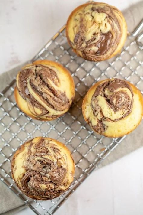 Nutella Swirl Cupcakes: Rich, buttery cupcakes with decadent swirls of nutella baked right on top.  These easy self-frosting nutella cupcakes are the perfect recipe to share! #bunsenburnerbakery #cupcakes #muffins #nutella Vanilla Nutella Cupcakes, Buttery Cupcakes, Latin Desserts, Cookies 2023, Nutella Recipes Easy, Nutella Cupcakes, Swirl Cupcakes, Bunsen Burner, Orange Cupcakes